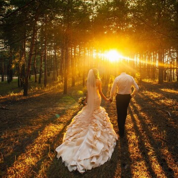 Newlyweds Anna and Alex are depicted in this photograph in symbolic move! They go hand in hand in the same direction. This is the path towards the light and life and endless love for each other.