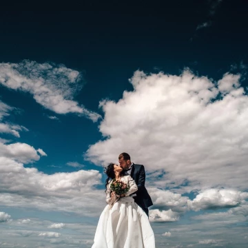 In the frame the couple from Odessa Elena and Dmitry. It was a great day! nature has done us an incredible gift in the form of a massive white clouds. Of course, we did not hesitate to found a spacious place and photographed a gentle kiss on the newlyweds. The love is the same boundless as it is a beautiful sky!