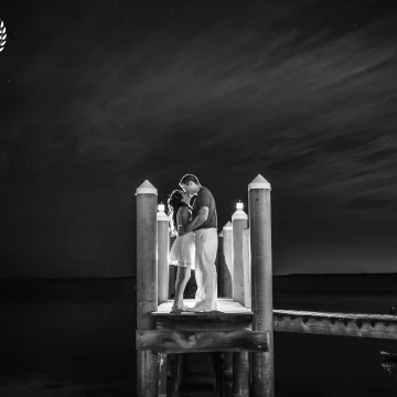 This photo was taken just after the couples reception ended around midnight. They ran inside to change clothes and we spent about 20 minutes photographing romantic starlight portraits. I recommend this to all my brides. 
