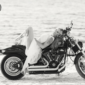 Renae’s Harley inspired wedding day was so kick butt, I had to get a shot of her draped on her man’s motorcycle! It was the perfect bridal shot! The groom went wild. 