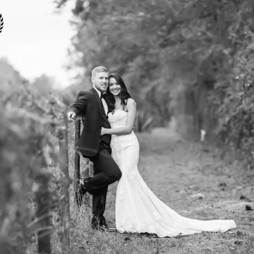 Kyle & Arselia are are old souls with a romantic southern love story. I wanted to capture this in their portraits, so I chose to photograph them along this old fence line and edit this photo in black and white for a timeless feel. 