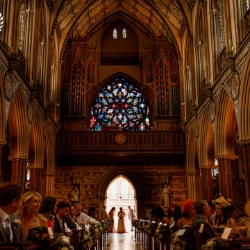 Rhalina about to come down the aisle at her London wedding ceremony. The church on Farm Street in Mayfair was pretty bland from the road but wonderful inside.