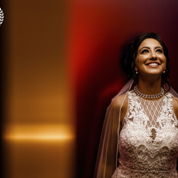 This was captured at a lovely Indian wedding late last year. <br />
The bridal shot was captured in a lift with the gold reflecting from the lift door as it closed and the red was the carpeted lift sides.