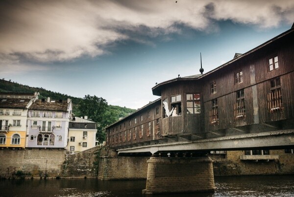 The picture was taken on the lovely wedding day of Kristina & Vesko. This is The Covered Bridge of Kolyu Ficheto in Lovech, Bulgaria. The bridge is unique and in Europe there are only 3 such bridges - in Lucerne, Florence and Erfurt.