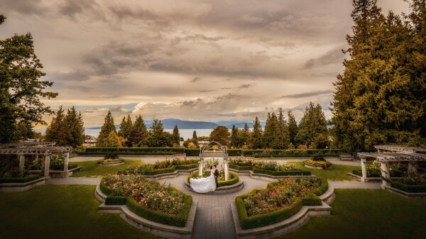 People from Vancouver will understand the amount of rain we get is ridiculous! So we are lucky to have a little cloudy break in the afternoon to come to the University of British Columbia, where the couple went to school. They stood in the middle of the rose garden, snap! A beautiful combination of the over casting clouds, mountain and ocean views, a little bit of blooming roses and of course the lovely couple!