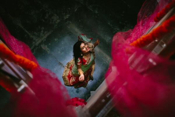 Anisha had a beautiful and colorful Indian wedding in Raipur. I wanted to capture her personality and the colors and energy of the place so I asked her to dance in rounds and have fun. This photo was captured from the 1st floor of her beautiful house, before going to the first celebration of the week.