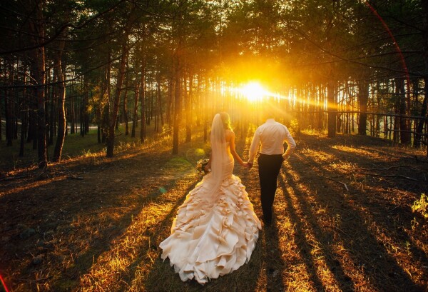 Newlyweds Anna and Alex are depicted in this photograph in symbolic move! They go hand in hand in the same direction. This is the path towards the light and life and endless love for each other.