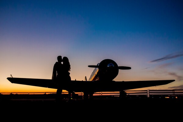 Love was in the air! Inspired by the movie Casablanca, Haley-Kate's and Rafael's first half of their session was shot during a gorgeous sunrise at an Atlanta Airport with some with World War II airplanes as the background. It was shot with a Canon EOS 5D Mark III with natural light. Can you feel the love?