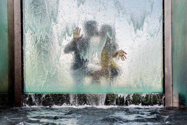 As Lao Tzu once said:" Nothing is softer or more flexible than water, yet nothing can resist it."  In this abstract style photograph, Haley-Kate – an Atlanta Falcons Cheerleader, and Rafael – a Brazilian soccer player could not resist showing their relationship behind a wall of flowing water. Love is so wonderful!