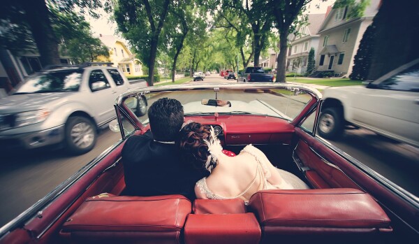Nikki and Evan were such a unique and amazing couple! The details and work they put into their wedding day continually amazed me and I love the vintage 50's style that accompanied them. Towards the end of their bride and groom session, we took an old car for a drive and I sat on top of the back seat to get this shot of them driving away together! I love this photo and happy to have the perfect couple to do it with :-) 