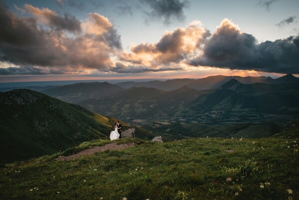We decided to climb a mountain to see the world better and take pictures during the sunset. So we hiked to the Plomb du Cantal, Central France, and stood in the chilly wind, with an amazing mountain view, and watched the sun set in the clouds.
