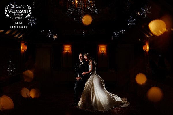 This picture was done at a venue that doesn't deliver much backdrop on an awful winter day. With sideways rain there was no way the bride was going to go outside, and with little scope for anything too exciting indoors I made this composite image with about 7 exposures using just a speedlight on the couple.
