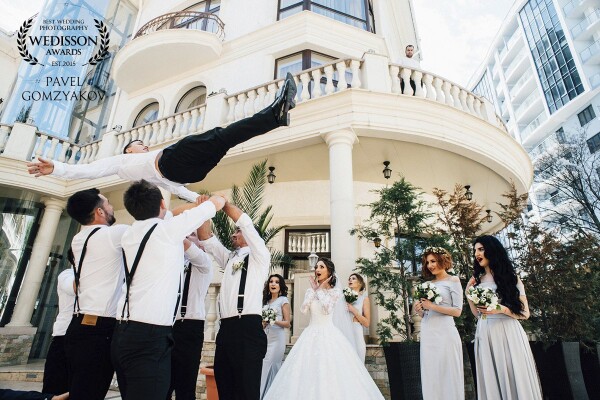 This shot is filmed in Odessa. Alena and Nikita are happy! Newlyweds are surrounded by close friends who have fun and are sincerely happy about the birth of a new family.