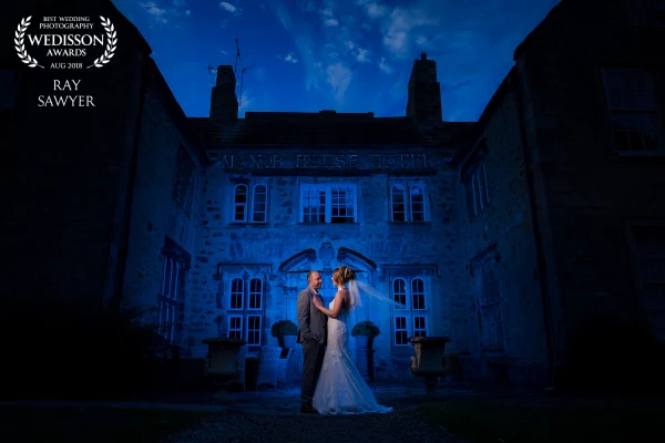 Andrew and Jeniffer were such a lovely couple. This was my first time shooting at this venue and they wanted a photo in front of the building, typical thinking would of been a daytime looking shot but i decided to go for something a little more epic. I placed a Blue creative gel behind them pointing at the couple and a full CTO gel camera right to light them which in turn allowed me to bring down the in camera Kelvin to make the building more blue. Ambient exposure was darkened by 2-3 stops.