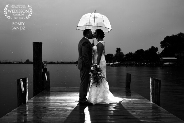 The bride was worried about the rain all day but I made sure to let her know no matter wha the weather was we would make these photos something special and be able to tell the story exactly as it is no questions asked! We dodged the rain all the way up until the couples portrait session towards the end but with a handy umbrella we were able to create this in the slightest of rain! IT was the perfect ending before we started partying on the dance floor!