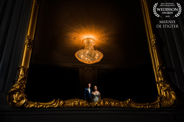 This awesome couple had a beautiful wedding in the old city center of The Hague. The prestigious room where the got married had this big chandelier and large mirror so the moment I walked in the room I knew I had to take a shot with them later that night. Both the wedding couple and I are really happy how it turned out :)