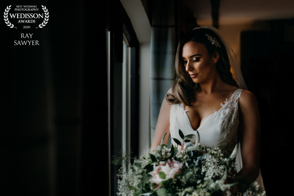 Taken just as bride prep was finishing and the bride was heading off to the ceremony. Sometimes simplicity and window light are perfect.