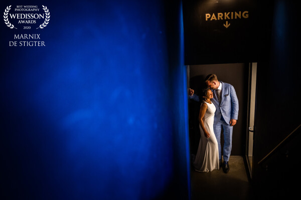 At the end of this beautiful wedding day, I saw the hallway to the place where their car was parked and just had to take this image. I love their poses and how the image turned out.