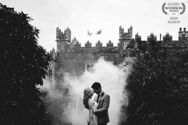 My second award from Olivia and Darragh's wedding at Waterford Castle, Ireland. I wanted a moody theme for this one, shooting it slightly under exposed and popping off a white smoke bomb behind them for that extra effect. Love this shot!