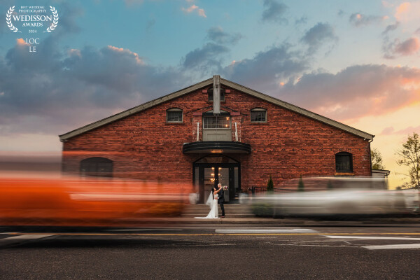 Embracing their special day amidst the vibrant downtown vibes. The magic of long exposure captures t...