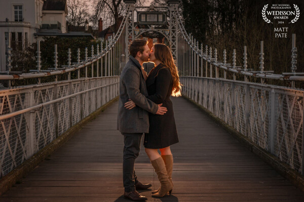 Another image taken on the beautiful Queens Park suspension bridge, this time using off camera flash to create a warm glow around the couple. the flash with a CTO gel ( colour temperature orange ) to create the warmth. The actual setting sun was over to the right of the image.