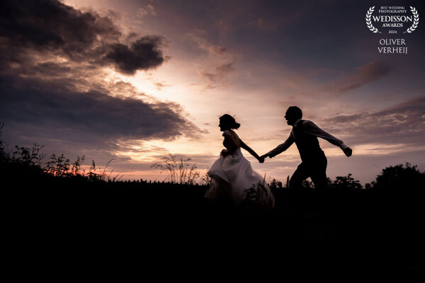 Running towards a new life together behind the twilight.