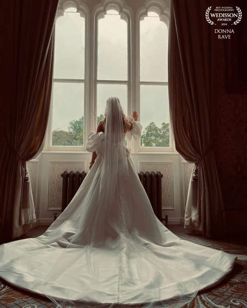 The stunning bride taking in the views of Cabra Castle in Ireland.