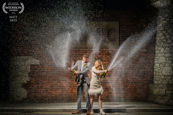 I was absolutely shattered by this time in the evening at Anna & Jamie's wedding, but I had promised them a champagne shower image, so here it is. I'm creating these champagne shower images regularly now, so find it a fairly straightforward shot to set up. A light behind the couple and a groomsman holding the key light.