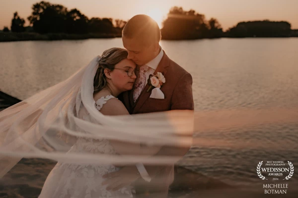 Just married and enjoying a little moment with each other during golden hour.