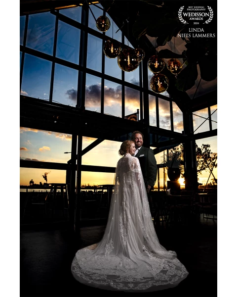 This wedding took place at the Torpedoloos in The Netherlands. When we saw these beautiful light fix...