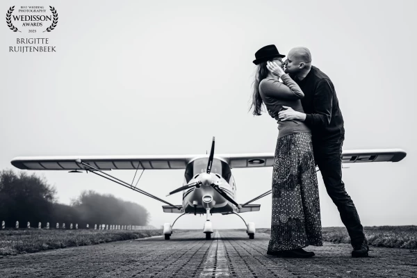 A pre-wedding shoot at a special location, with an airplane in the background—adventures just around...