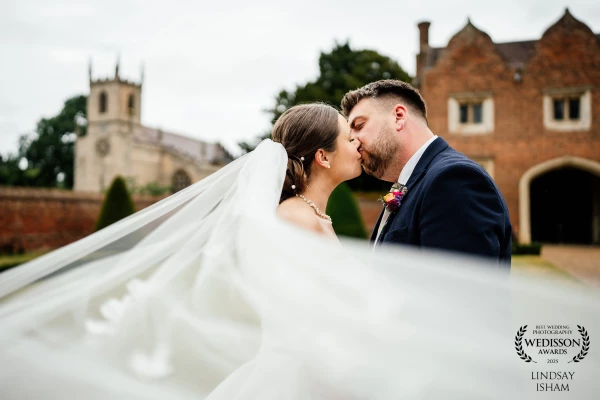 LILY & JAKE<br />
<br />
Their Doddington Hall wedding was simply perfect!  We headed out into the gardens just as the rain cleared.  There was just enough wind to capture this wonderfully timed veil shot.