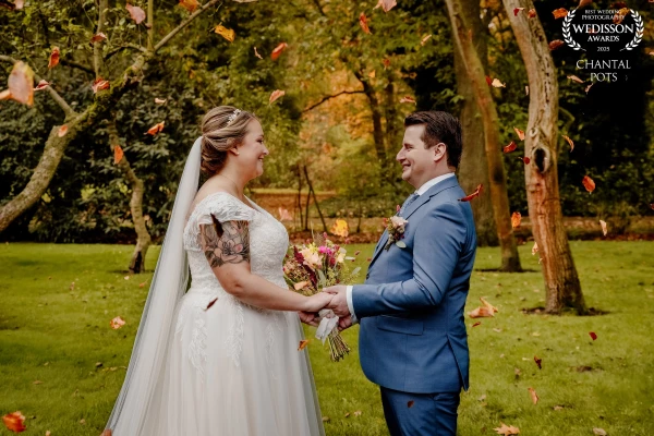'A magical autumn moment, where love fills the air as much as the falling leaves. Their smiles say i...