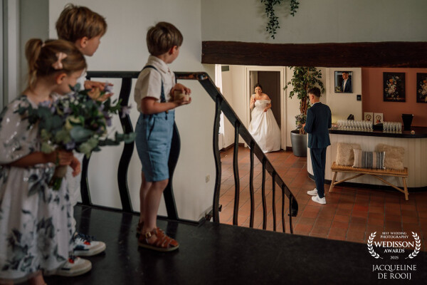 The moment she entered, time seemed to pause. The children turned their heads in wonder, holding flo...