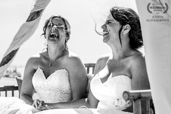 Just a laugh, the wind in their hair, completely in the moment. I love these spontaneous moments dur...