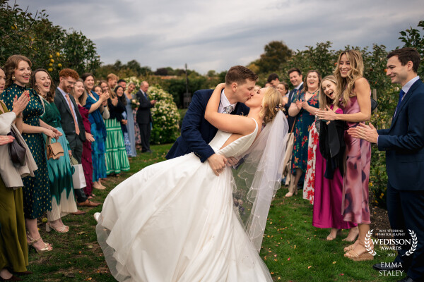 Esta and Joe stop mid confetti for a gorgeous kiss