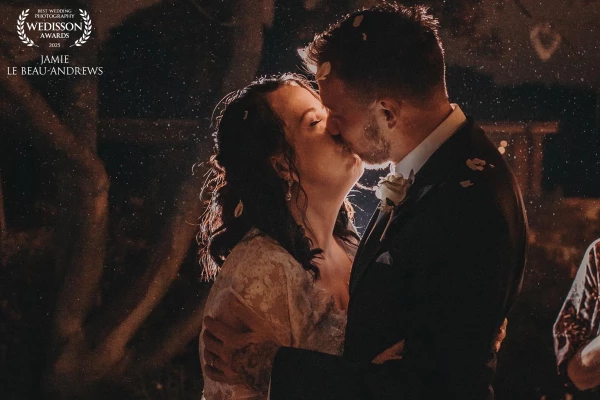 A nighttime confetti throw during Janine & Bret’s twilight wedding at Langtons House turned into som...