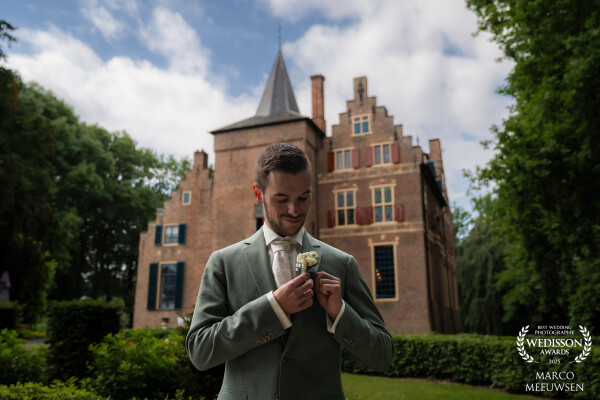 The moment just before Tycho walks in. His family is already seated. A small adjustment, one last de...