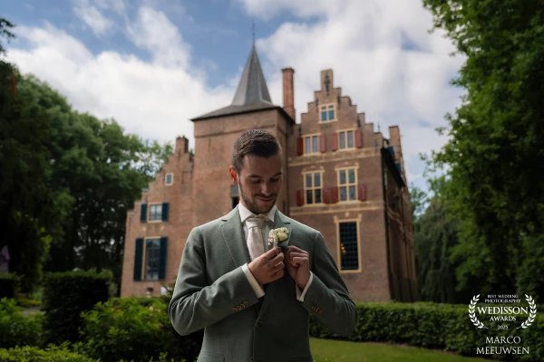 The moment just before Tycho walks in. His family is already seated. A small adjustment, one last de...