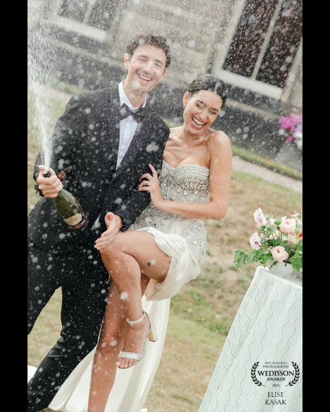 A simple champagne pop. The laughter that followed was completely genuine — one of those small, joyf...