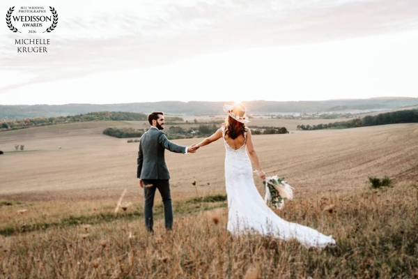 After cutting the cake, the bride and groom took advantage of the golden evening atmosphere for a br...
