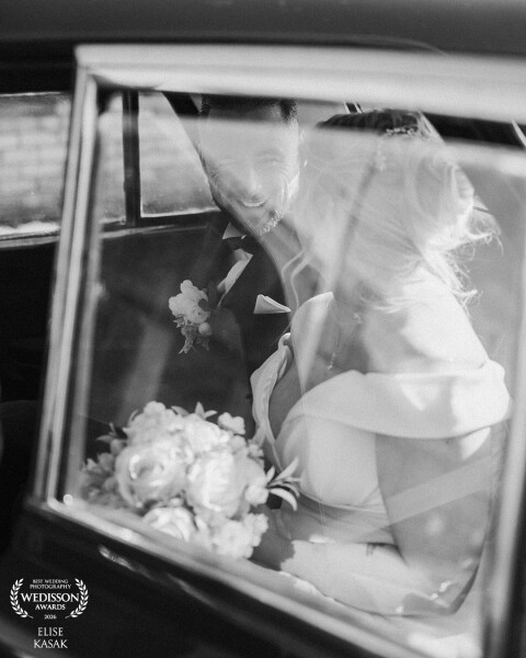 A quiet little moment for just the two of them, on the drive from the ceremony to the reception. A c...