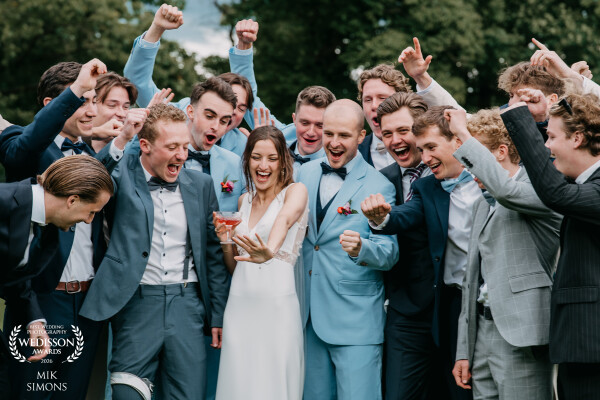 One of my favorite shots from Ellen & Wout’s wedding. The colorful blue outfits paired with those su...