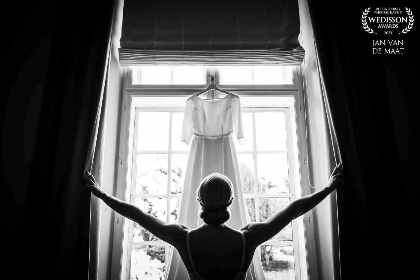 This scene was set in Holckenhavn Slot in Denmark. The bridal room had large windows with curtains so I decided to hang the dress in front of the window and had the bride open up the curtains. Let's get ready for this big day!