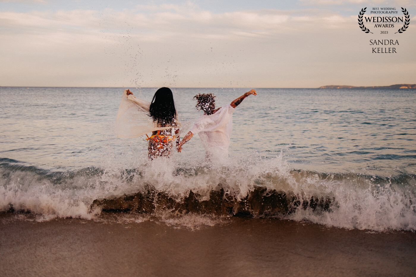 This shot was taken in October in France..the sea wasn't really warm, but after our couple session, they decided to take a swim..and off they went. I love spontaneous couples!