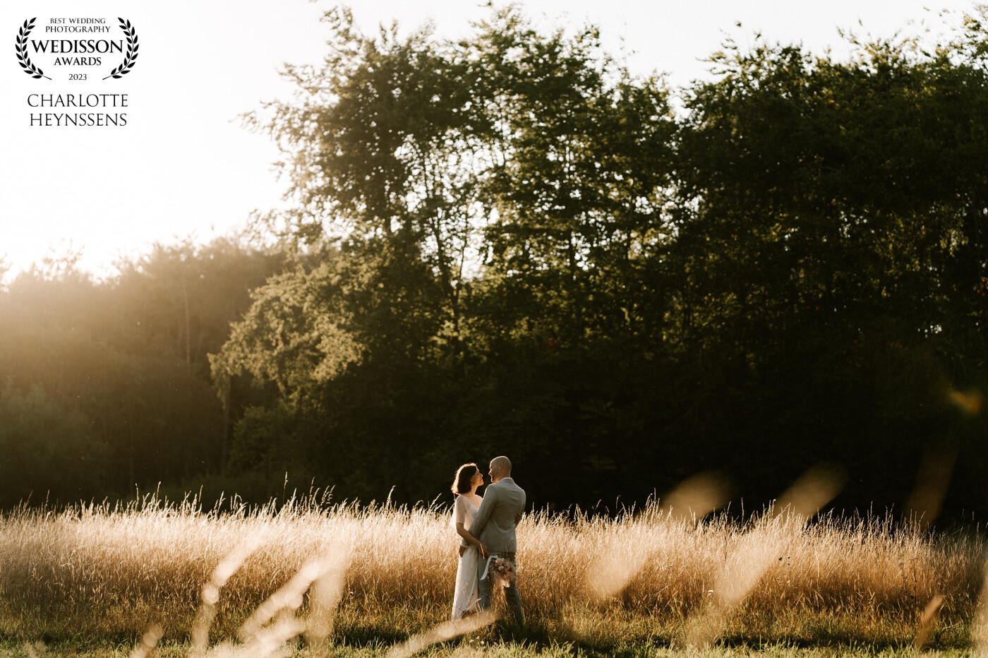 As I was walking with the couple through this beautiful landscape, the light fell just right on this patch of long grass. I made the couple climb over a small pit in order to get there, but they didn't mind. They started dancing and I was very happy to capture this moment.