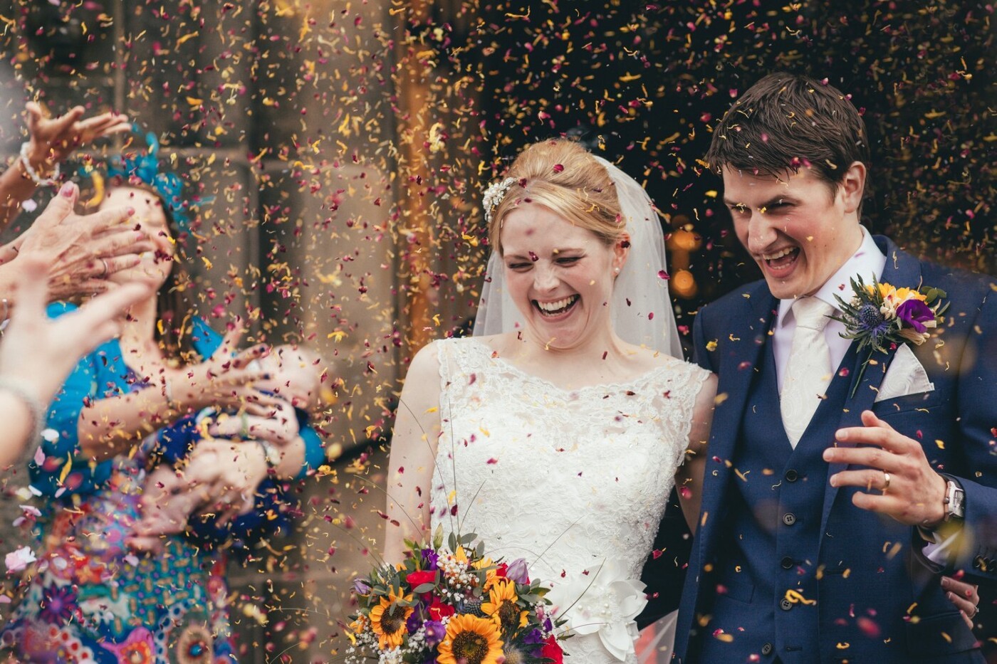 The expected, yet unexpected attack of the confetti. Rachel and Joe provided all their guests with this gorgeous real petal confetti, offered to all the guests by their beautiful flower girls. As the newlyweds left the church they were totally smothered in the colourful spray, this very moment really was as exciting as it looks.
