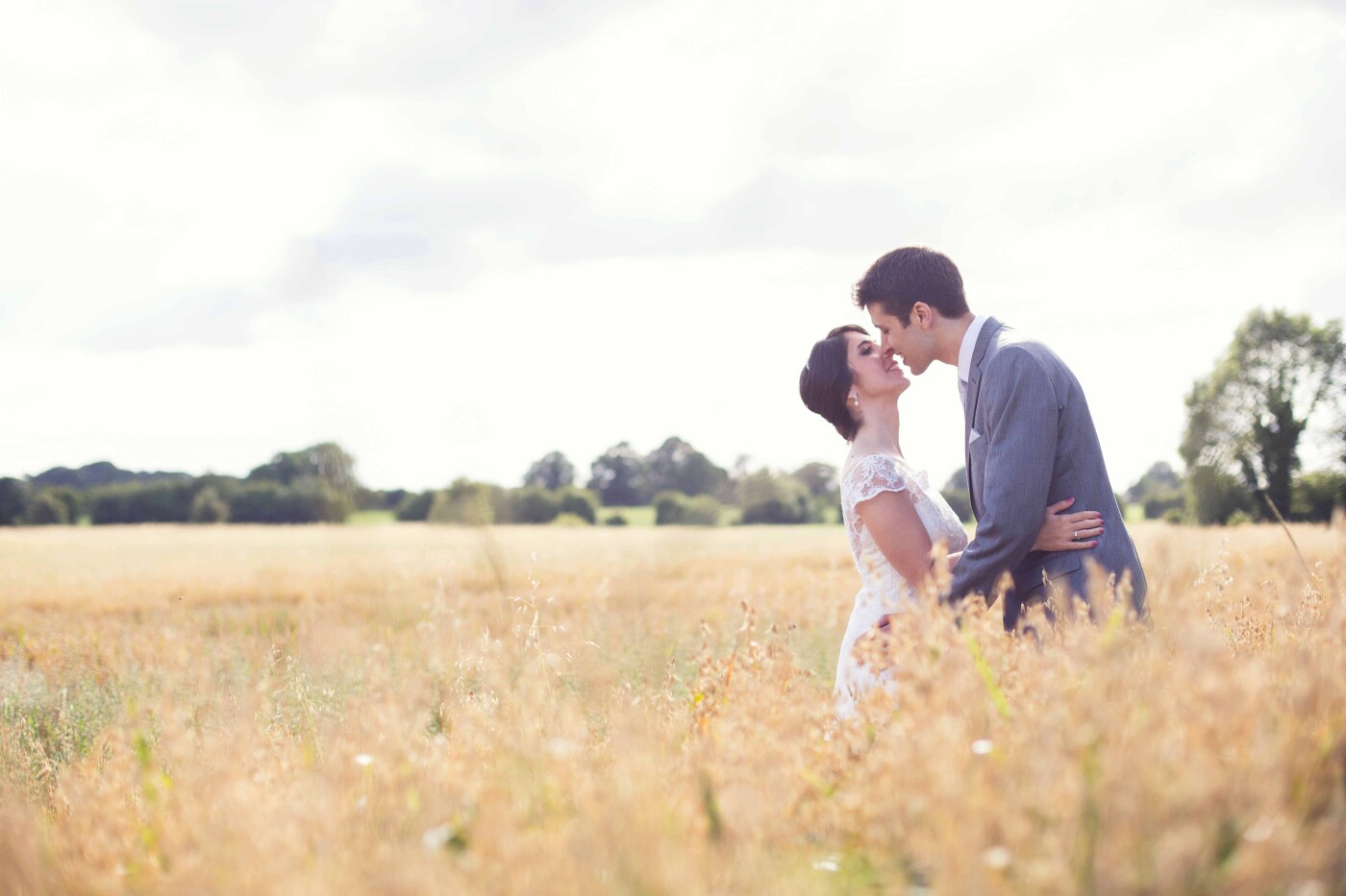 Helena and Lennard are a gorgeous couple. Helena is Brazilian and Lennard is Dutch, they met in Uruguay and got married in Ireland. After the ceremony we went to the hotel grounds for some photos and on the way we spotted this beautiful golden field. I asked them if they would like to stop and go in for a few photos and without hesitating they said yes. When they leaned in for a kiss the sun came out and made the moment magical. 