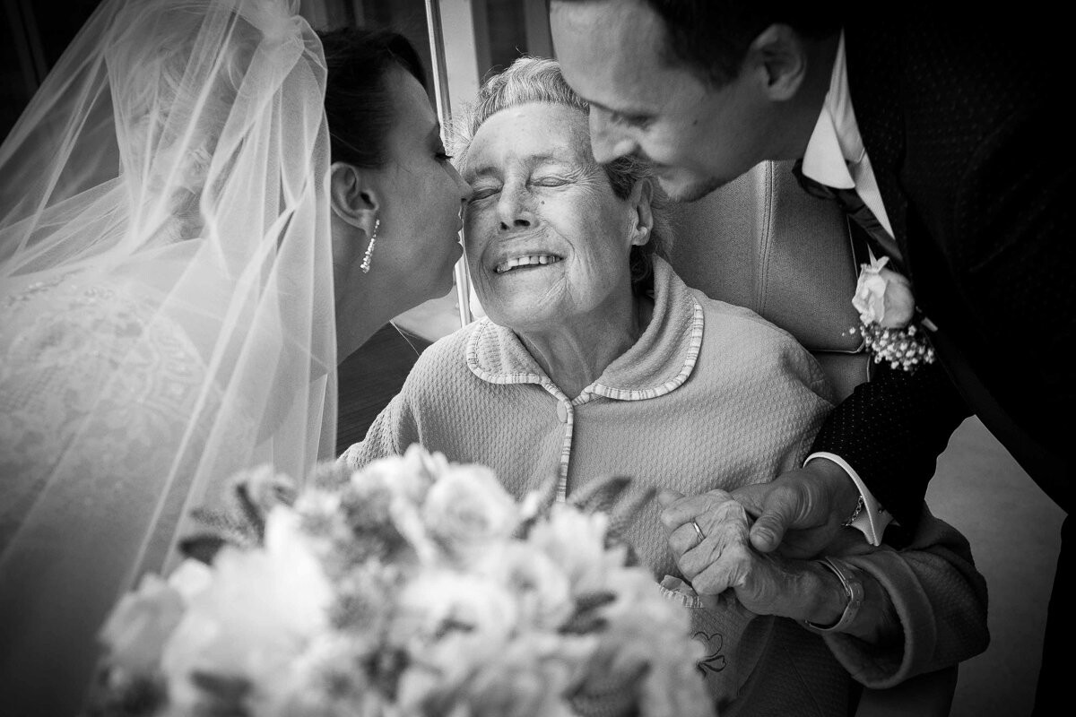 Right after the wedding ceremony was over, Monika & Roberto asked me to join them on a very moving moment. Roberto's grandmother could not attend their wedding because she was at the hospital. She desired so much to be there, that my clients visited her as a surprise. She waited and waited, hoping they would go see her and as soon as they arrived you could see the joy in her face. These were the strongest and most meaningful 5 minutes on their wedding day and there will always be this photograph to remind them about it. This was a moment that brought us all into tears of joy. Memories like this one remind me that our job as wedding photographers is so powerful. When grandma is no longer with us, this is the only place where my clients can go see her beautiful smile: a photograph. 
