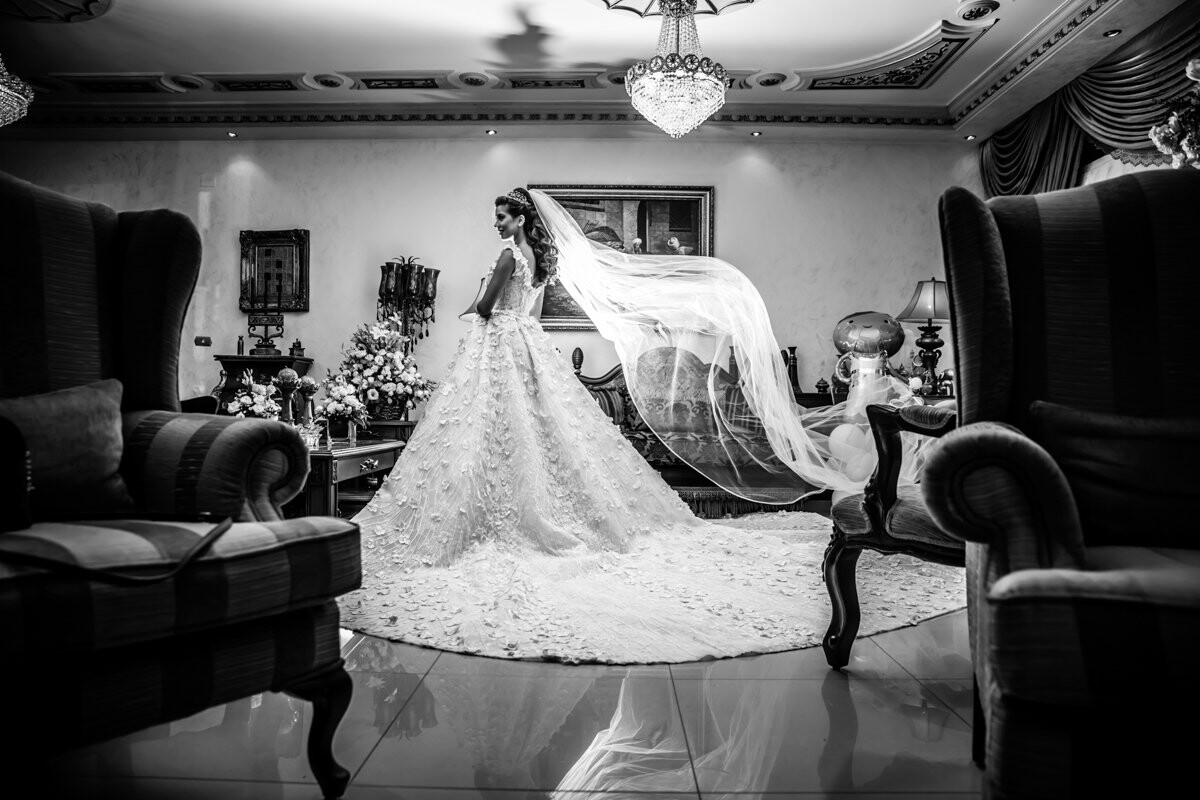 I remember the room being very crowded with family and friends and I had everyone out of the room except Leen, the bride. By the time I took this picture the whole family was behind me and only Leen standing there glowing with beauty and elegance. 